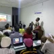 students in a classroom learning graphic design